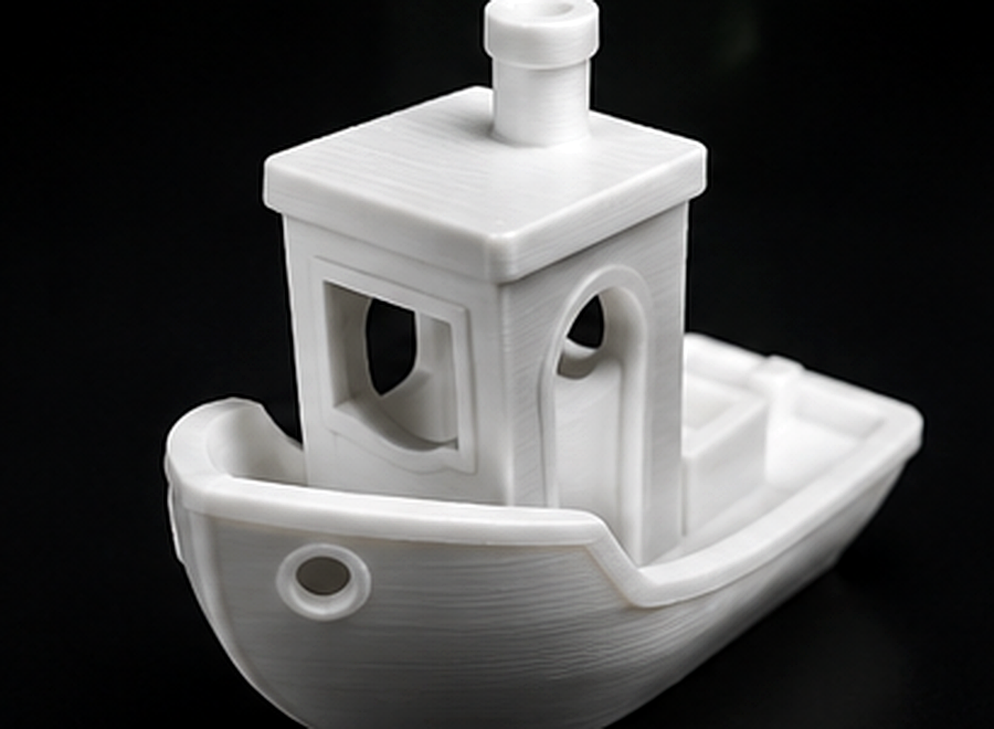 White 3D printed Benchy before electroplating